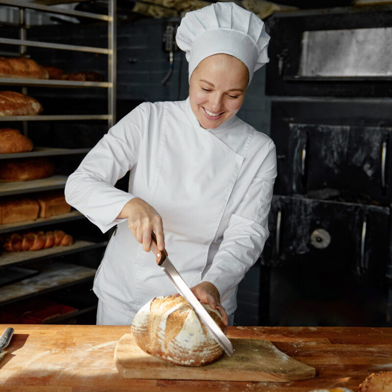 proffessional baker using albert & grace bread knife